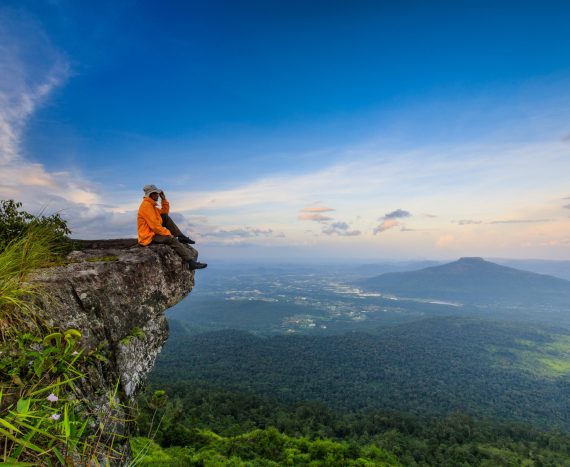 The hiking man touring on  high mountain in Loei province, Thailand.